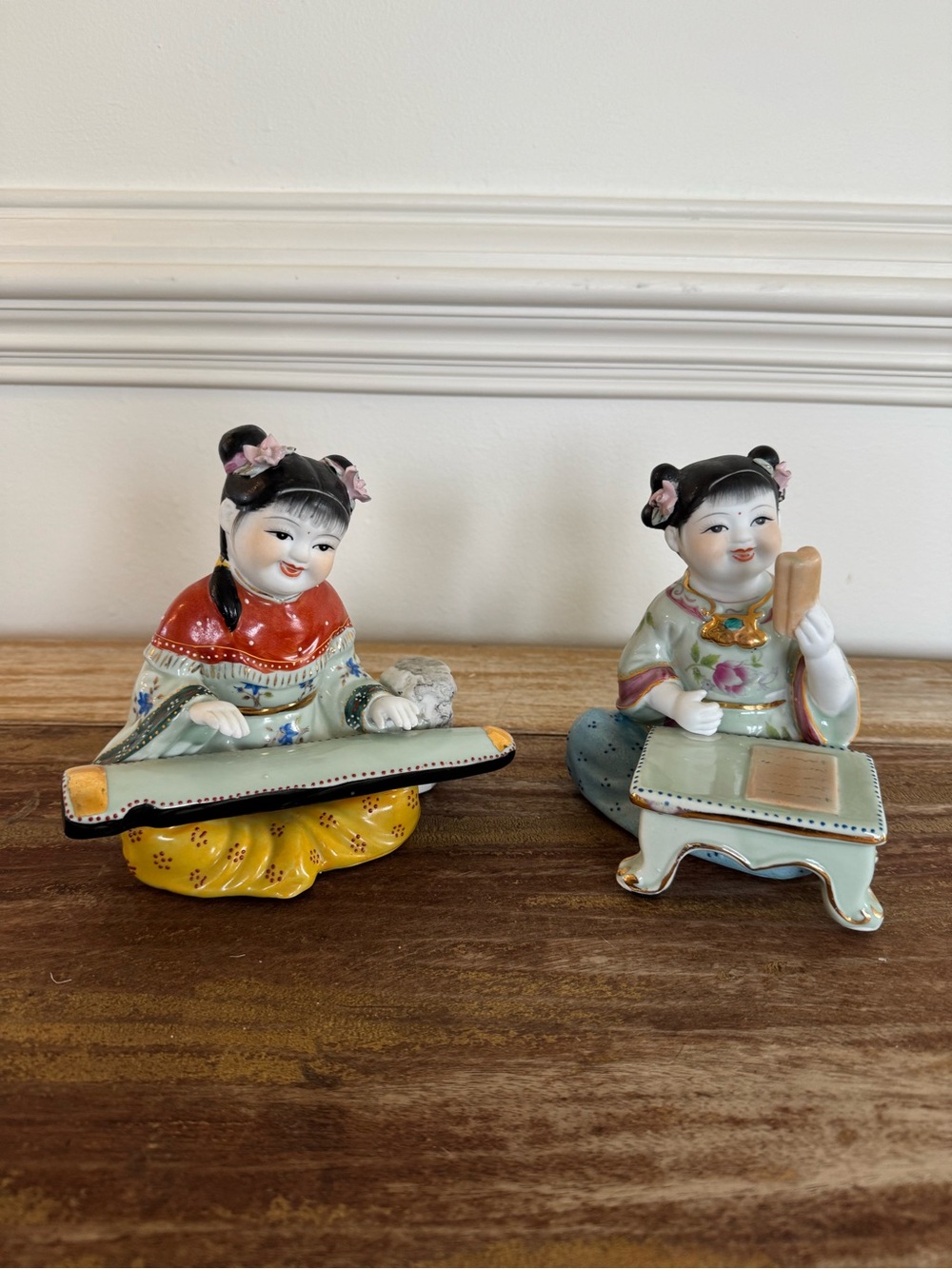 Pair of Hand-Painted Porcelain Girl Figurines in Multicolor Finish